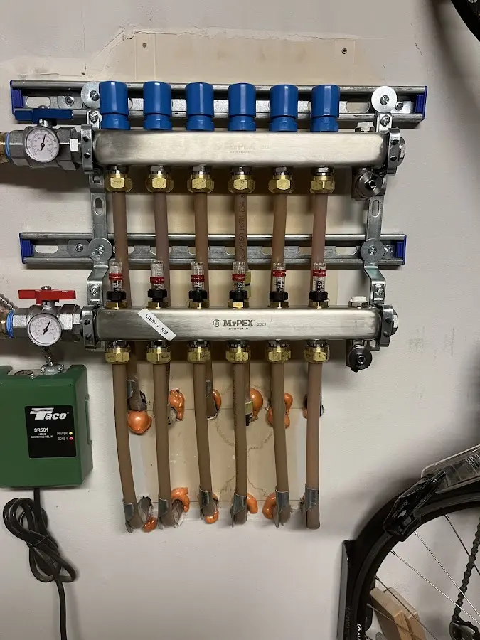 Plumber performing Water Heater Repair at a residential property in Timberlake